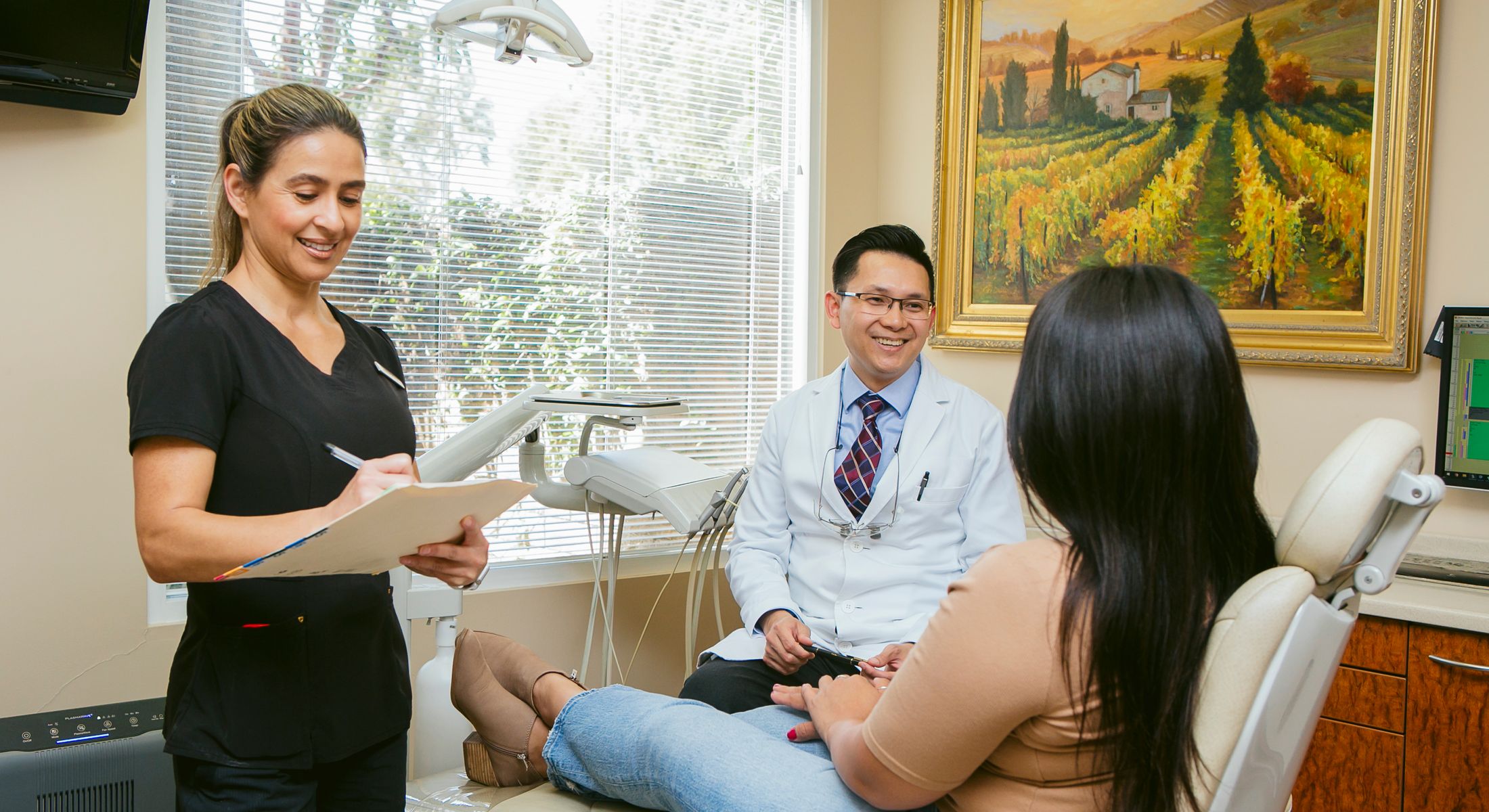 Dr. Chau and staff with patient